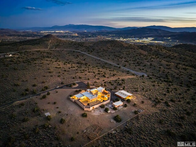 aerial view at dusk with a mountain view