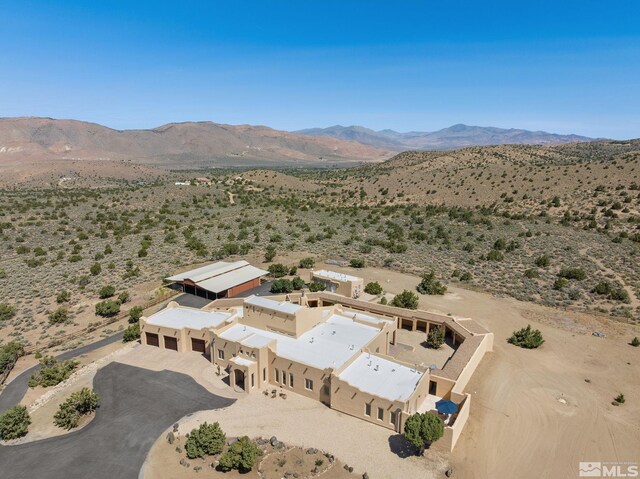 bird's eye view with a mountain view