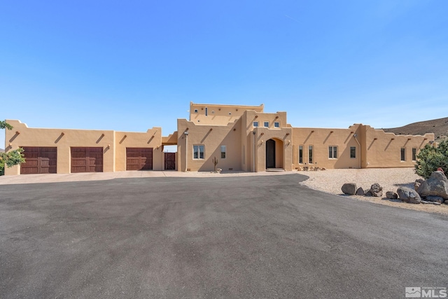 view of pueblo revival-style home