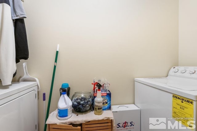 laundry area with washer and dryer