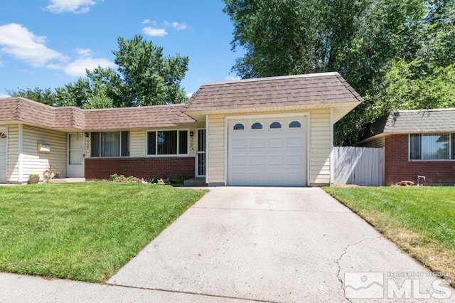 single story home with a garage and a front yard