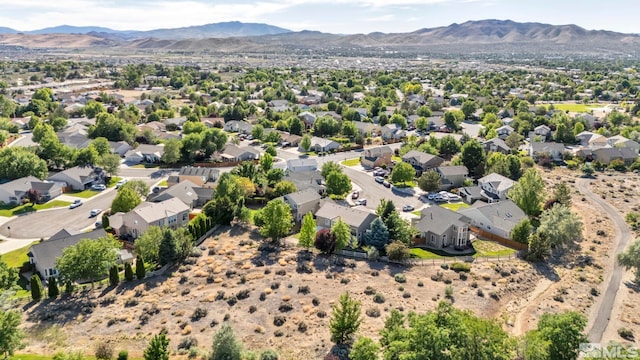 birds eye view of property featuring a residential view and a mountain view