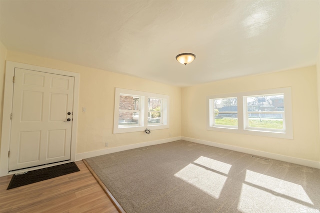 interior space with hardwood / wood-style flooring