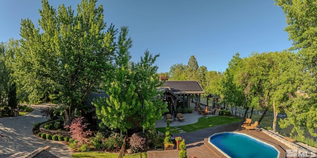 view of swimming pool with a gazebo and a patio