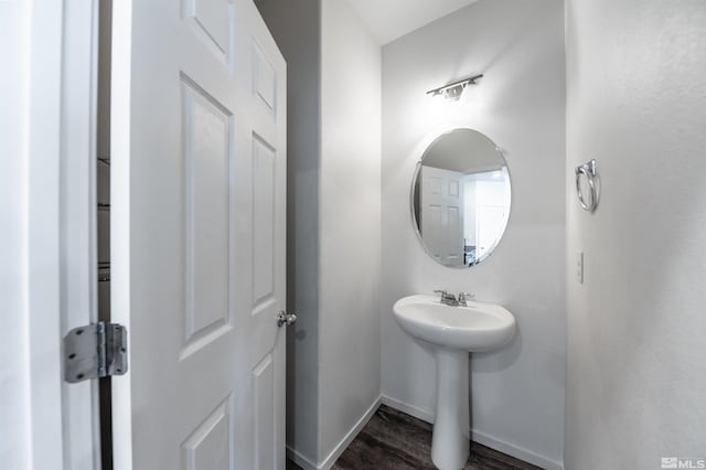 bathroom featuring hardwood / wood-style flooring