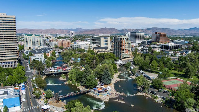 city view with a water and mountain view