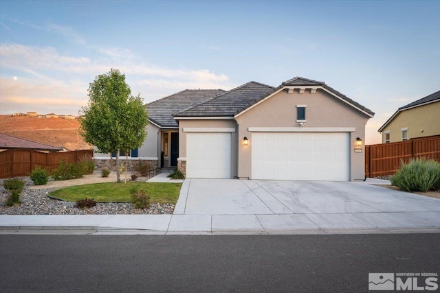 view of front of property featuring a garage