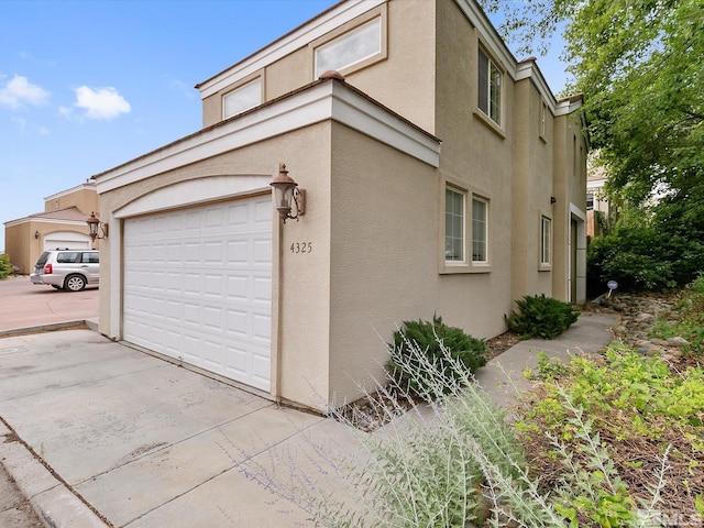 exterior space with a garage