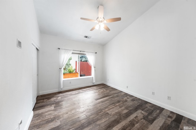 unfurnished room featuring ceiling fan, dark hardwood / wood-style floors, and lofted ceiling