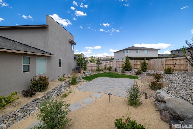 view of yard with a patio area