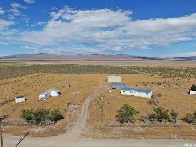 bird's eye view with a mountain view and a rural view