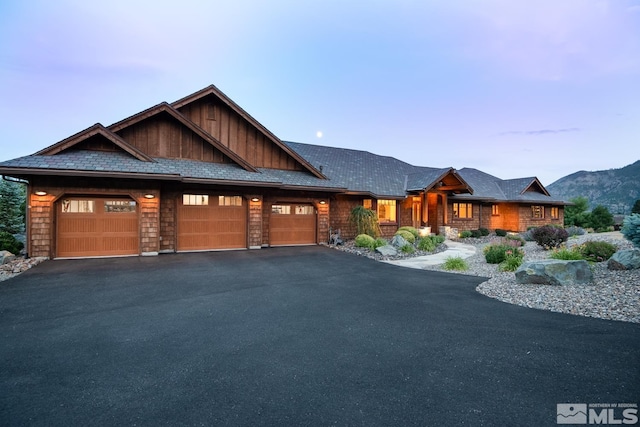 craftsman-style house featuring a garage