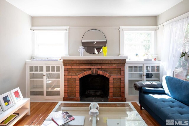 kitchen featuring stainless steel appliances, sink, butcher block counters, and white cabinets