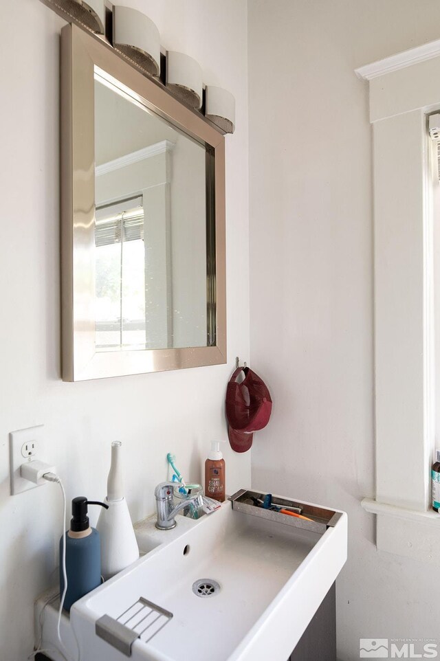 bathroom with tile floors, toilet, and vanity