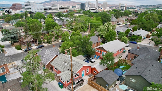 drone / aerial view with a view of city