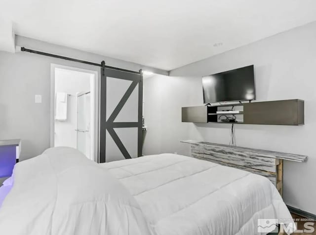 bedroom with a barn door