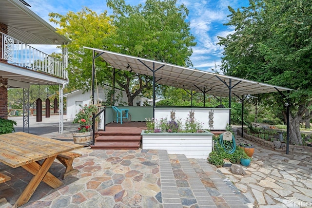 view of patio / terrace featuring ceiling fan