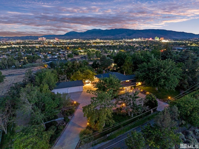 aerial view at dusk with a mountain view