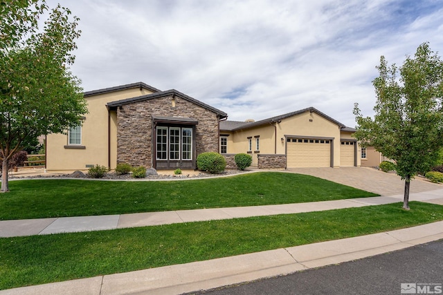 view of front of house with a front yard, stone siding, and stucco siding