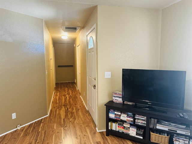 hall featuring hardwood / wood-style floors