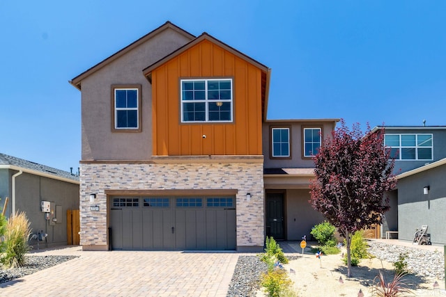 front of property with a garage