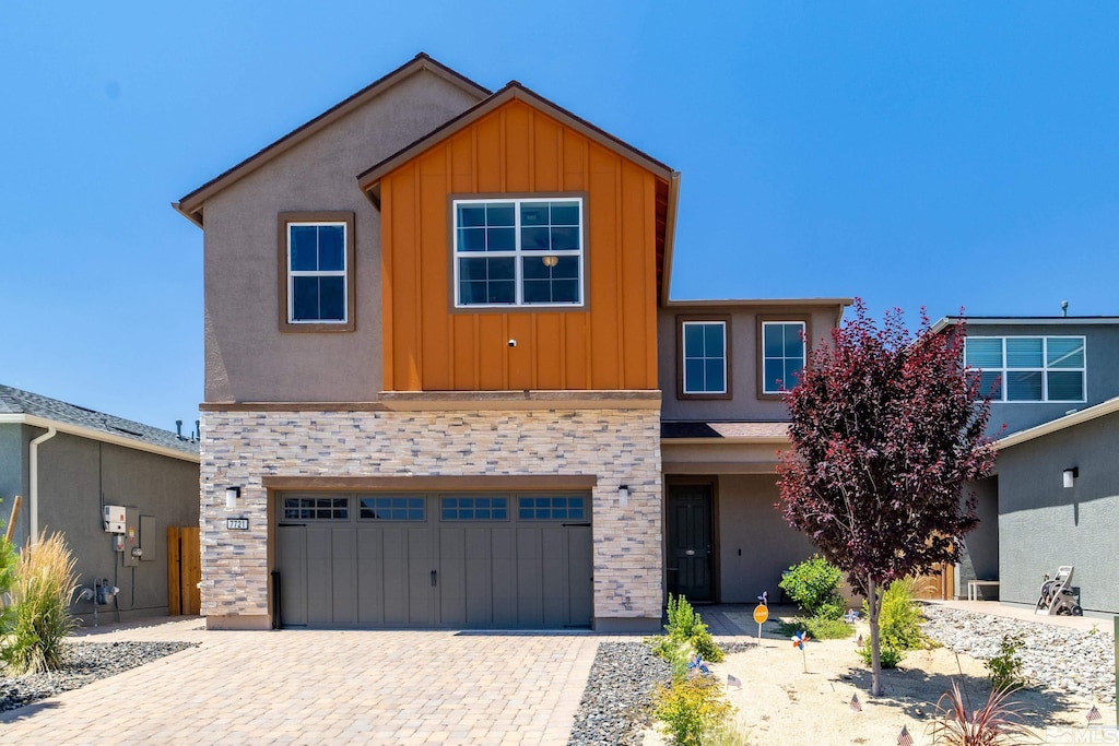 front of property with a garage