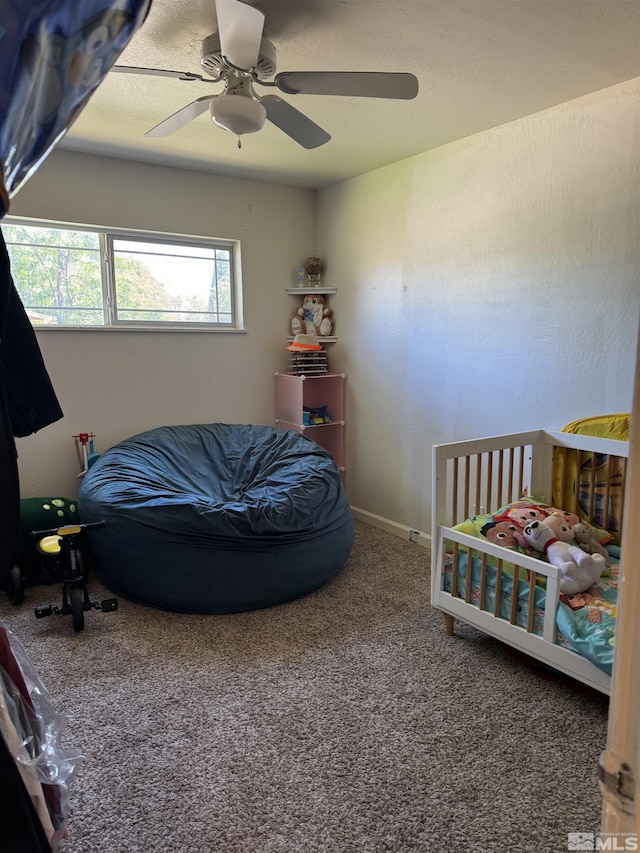 bedroom featuring carpet flooring and ceiling fan