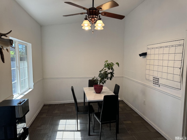 dining space featuring ceiling fan