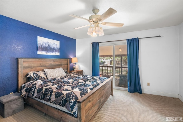 carpeted bedroom featuring ceiling fan and access to exterior