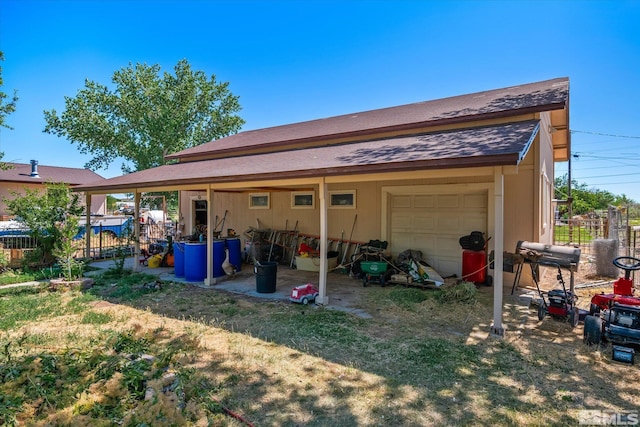 exterior space with a garage