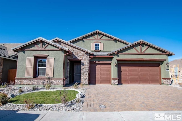 craftsman-style house featuring a garage