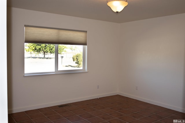 view of tiled empty room