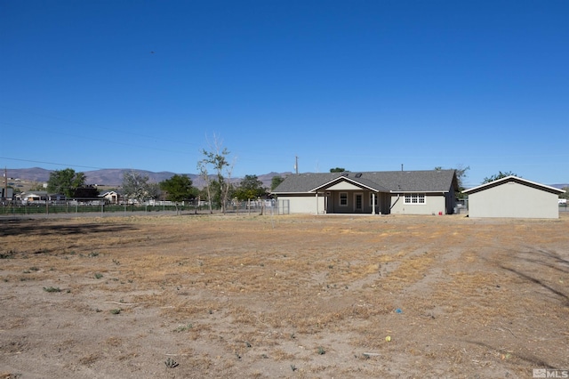 ranch-style house with a mountain view