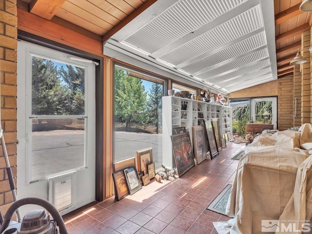 sunroom / solarium with lofted ceiling