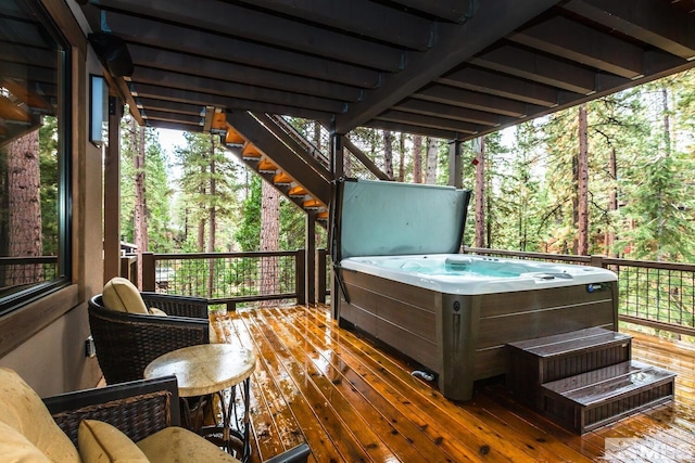 deck with a hot tub