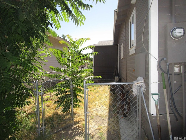 exterior space with fence and a gate