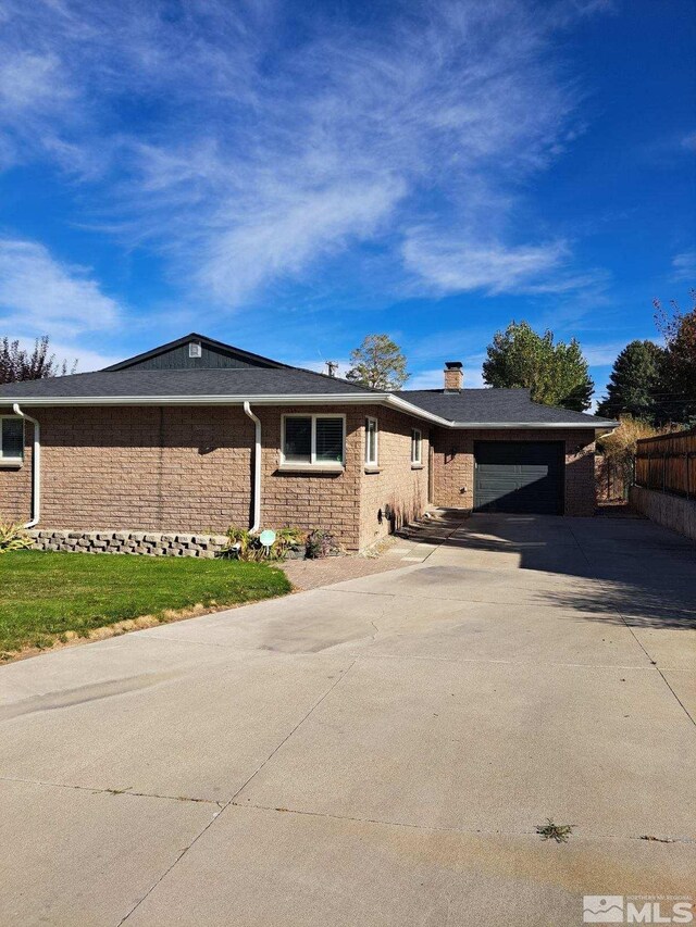 exterior space with a garage