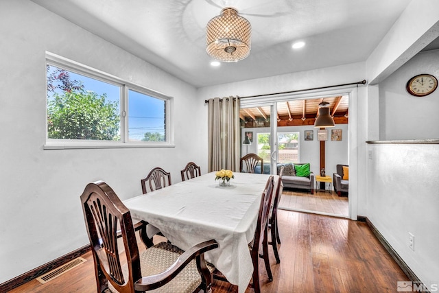 dining room featuring dark hardwood / wood-style flooring