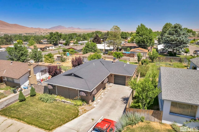 drone / aerial view featuring a mountain view