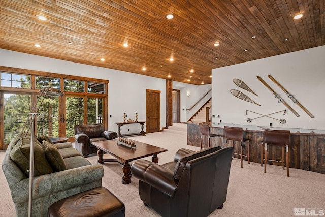 living room with carpet, french doors, and wood ceiling