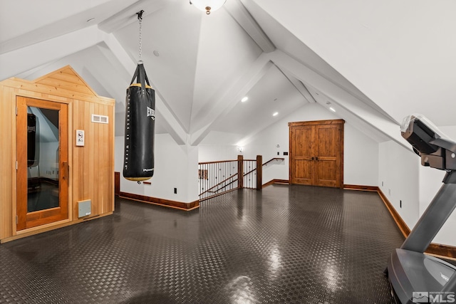 bonus room with vaulted ceiling with beams and wooden walls