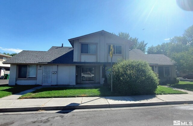 front of property with a front yard