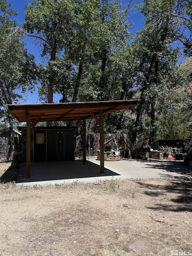 view of parking / parking lot with a carport