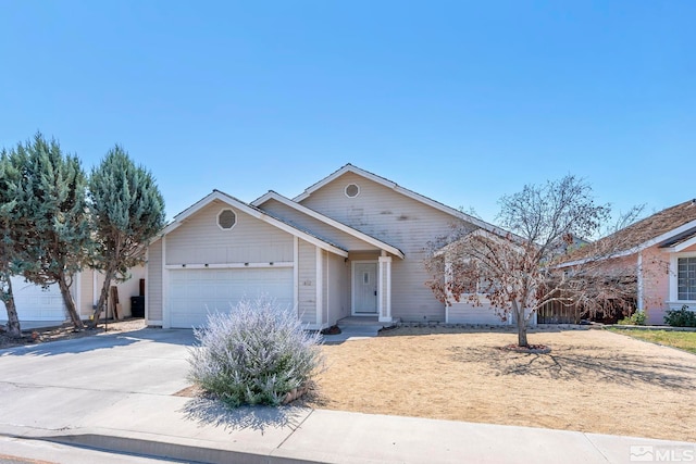 ranch-style house featuring a garage