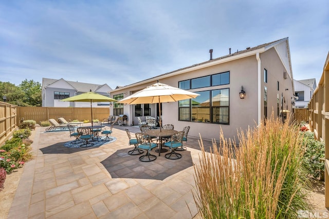 rear view of property with a patio area