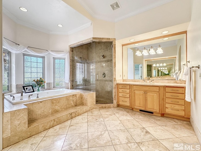 bathroom featuring ornamental molding, separate shower and tub, and vanity