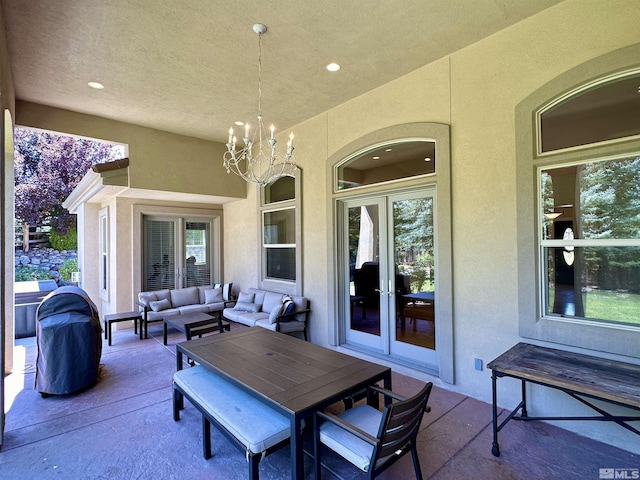 view of patio with french doors and outdoor lounge area