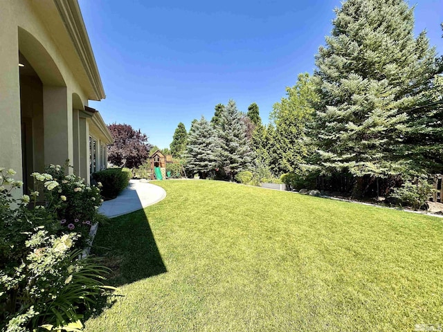 view of yard featuring a playground