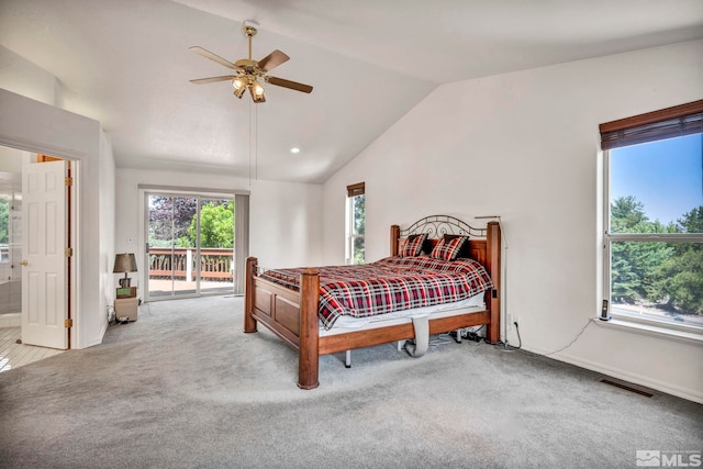 carpeted bedroom featuring access to exterior, connected bathroom, ceiling fan, and lofted ceiling