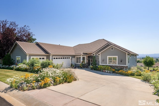 ranch-style house featuring a garage